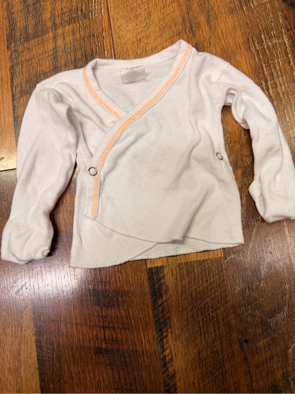 Wrap-Style Long Sleeve Baby Top in Light Cream with Peach Trim